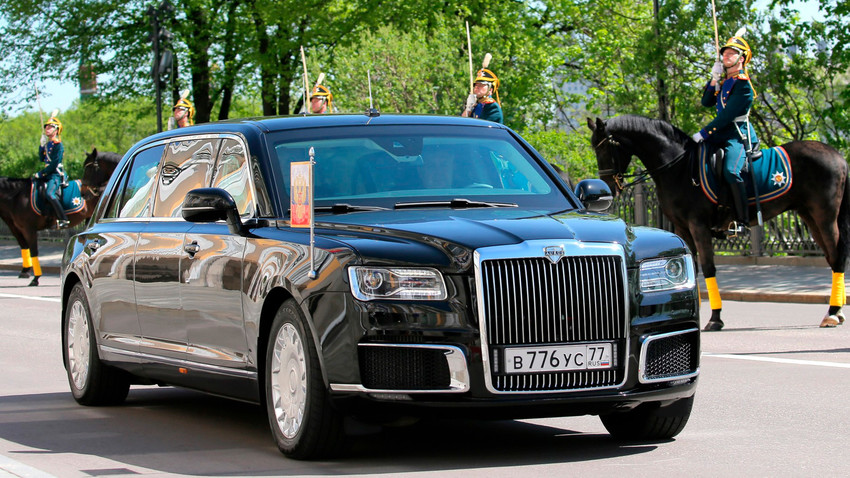 Vladimir Putin demonstrates the new "Kortezh" car during his inauguration.