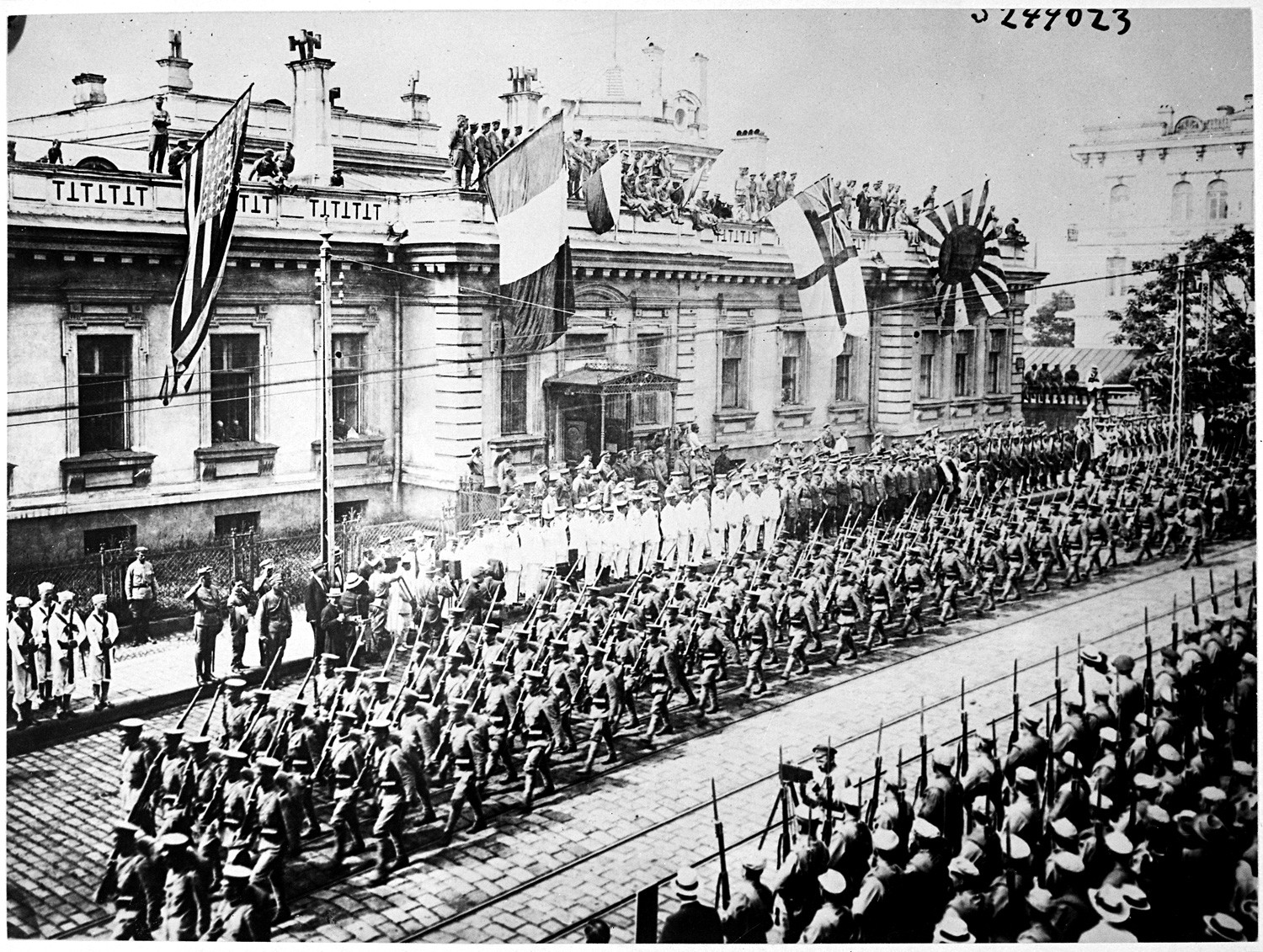 Vladivostok, Russia. Soldiers and sailors from many countries are lined up in front of the Allies Headquarters Building.