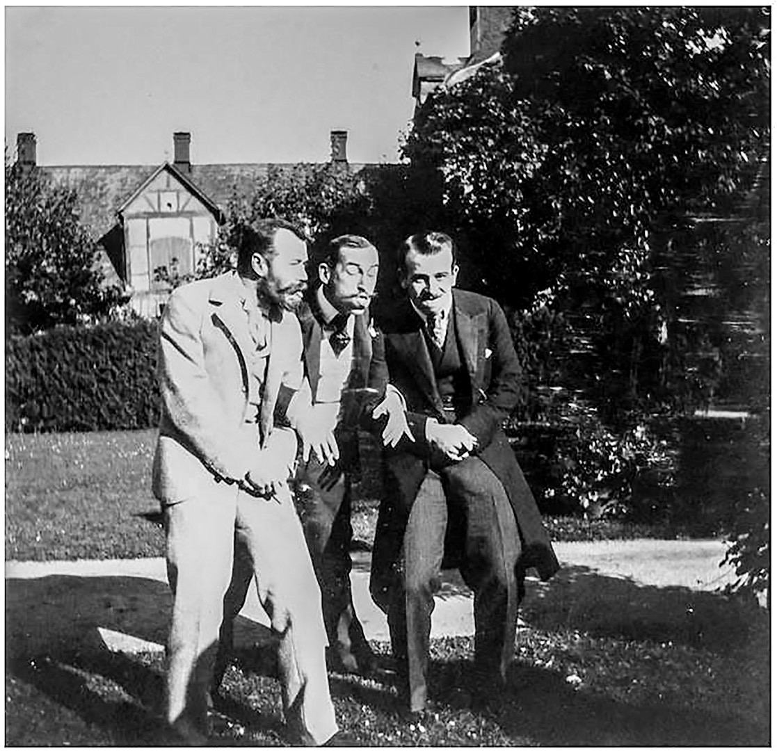 Nicholas II (L) fooling around with his friends, including Prince Nicholas of Greece (R)