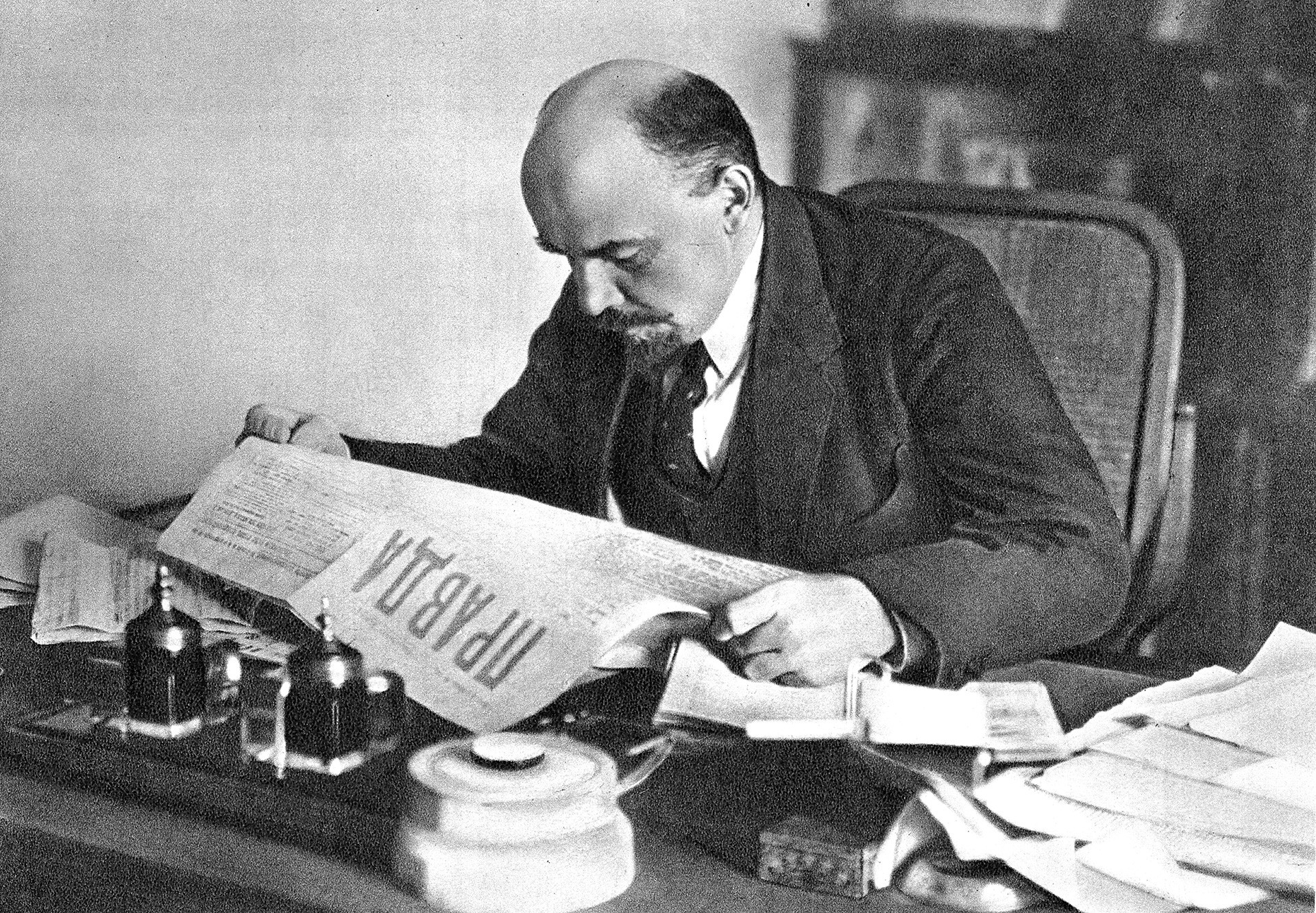 Vladimir Lenin reading 'Pravda'