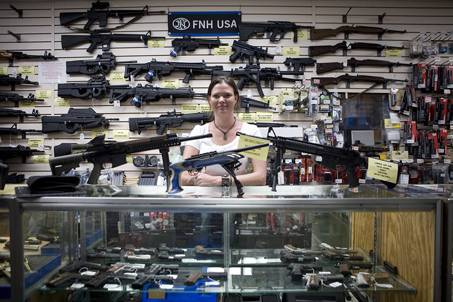 Standing opposite of Russia, the United States celebrates loose gun laws