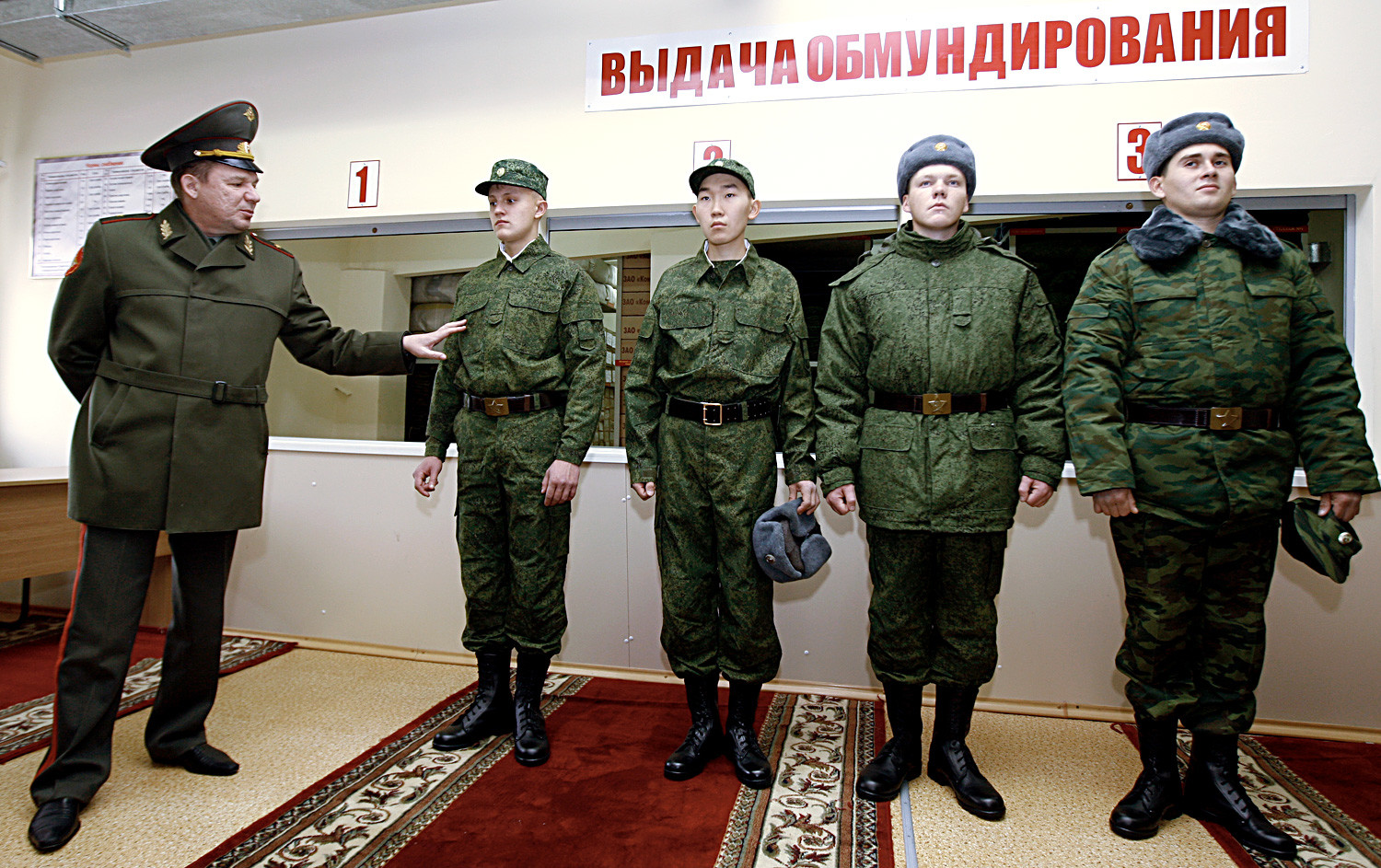 Recruits seen at the outfit room before leaving for the army service from a Kazan conscription office. 