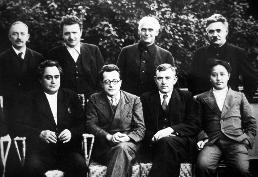 Executive Committee of Communist International (Comintern) in 1935: Otto Wille Kuusinen, Klement Gottwald, Wilhelm Pieck, Dmitry Manuilsky (L-R, sitting), Georgi Dimitrov, Palmiro Togliatti, Wilhelm Florin, Wang Ming (L-R, standing).