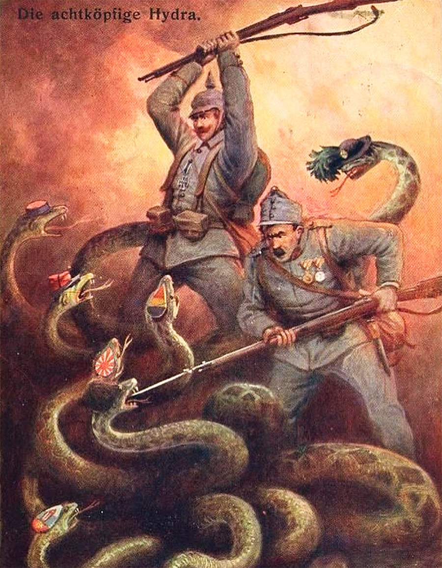 Nemški in avstrijski vojak v boju proti osemglavemu zmaju.
