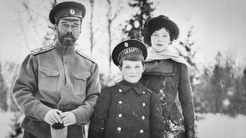 Tsarevich Alexei with his father and sister.