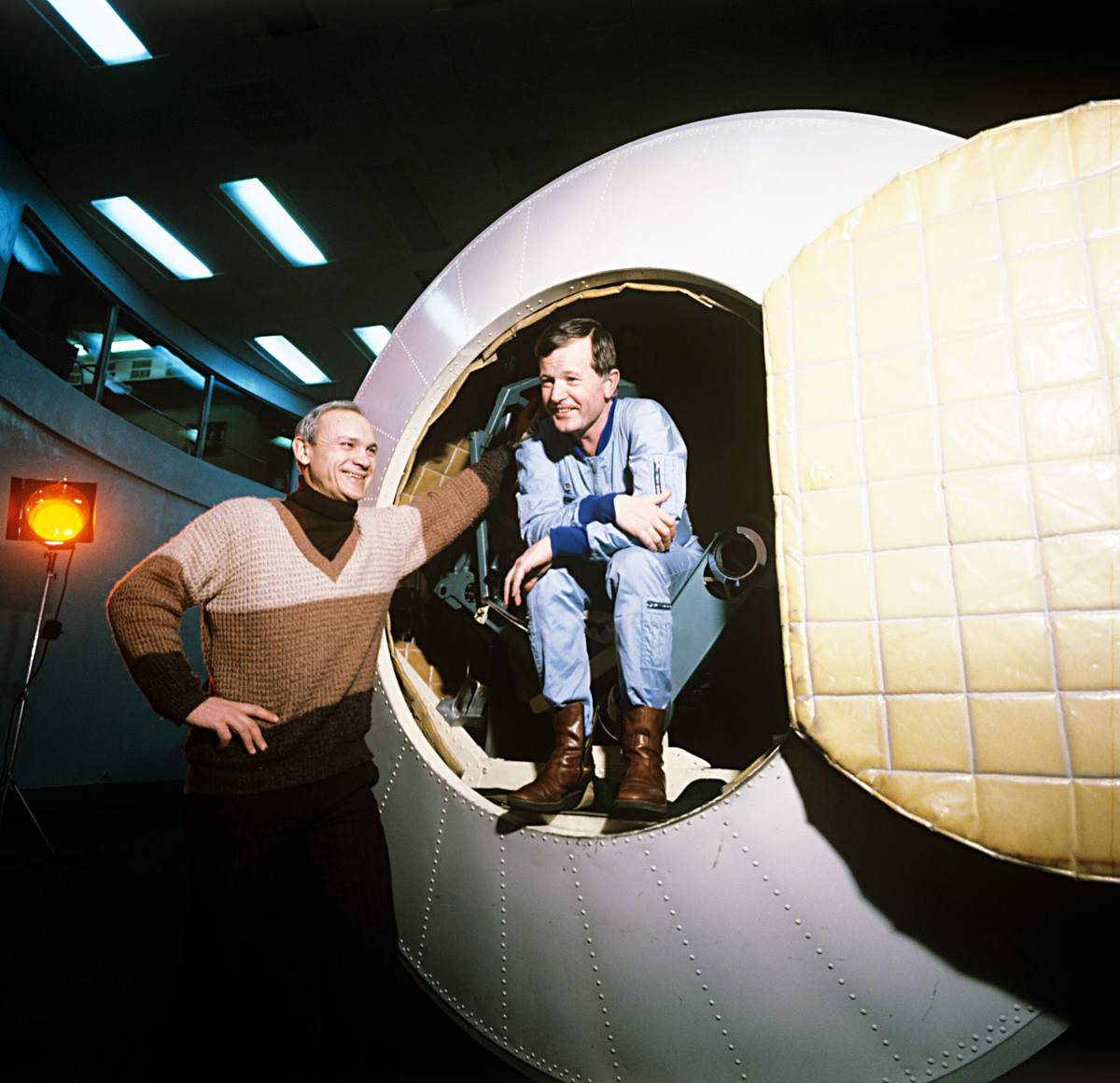 Vladimir Dzhanibekov (left) and French cosmonaut Jean-Loup Chrétien at Soyuz T-6 spacecraft