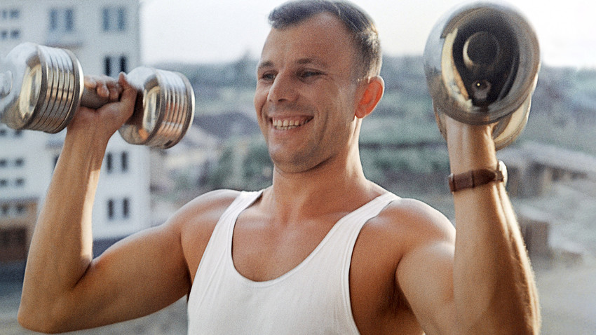 Pilot-cosmonaut Yuri Gagarin doing his morning exercises.