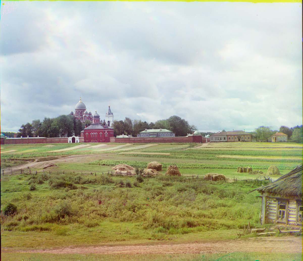 Spaso-Borodino Convent, north view. North Wall, Church of Decapitation of John the Baptist & Cathedral of Vladimir Icon (background). Summer 1911.