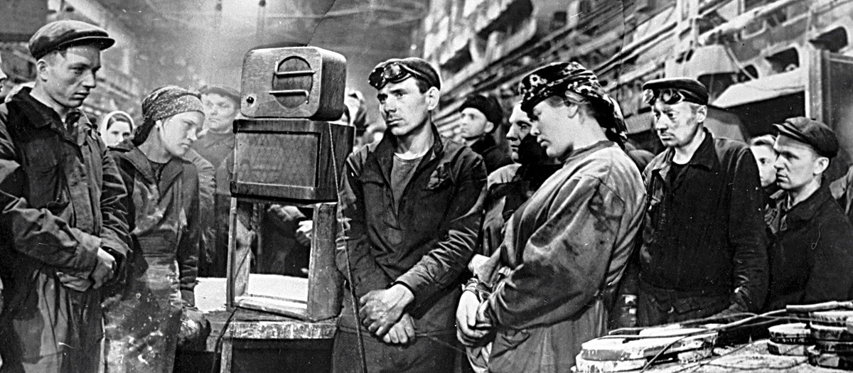 The Moscow-based Dynamo engineering works personnel listen to the radio as Joseph Stalin's death is announced.