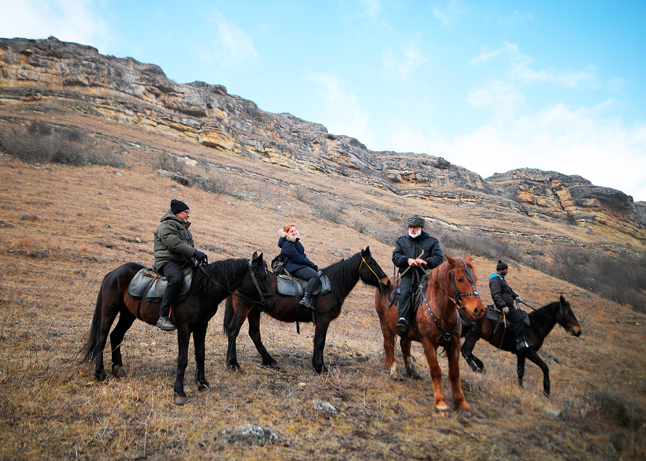 Riding horses near the village of Krasny Kurgan. 