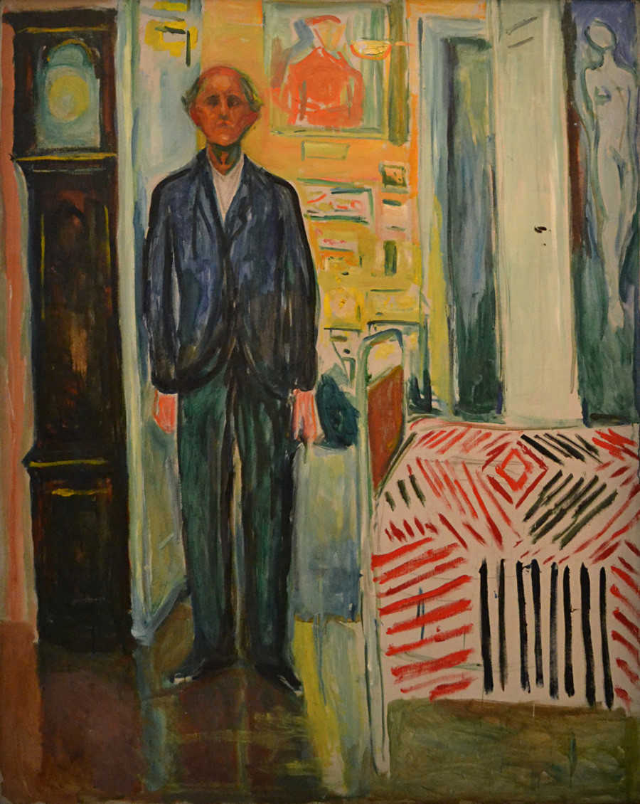 Autorretrato “Entre o Relógio e a Cama” (1940-1943). Edvard Munch.