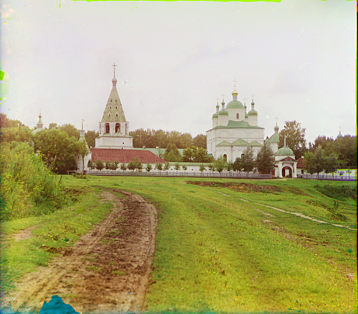 Luzhetsky-St. Ferapont-Nativity of the Virgin Monastery, east view. From left: Bell tower, Nativity Cathedral, Church of St. Ferapont (demolished), East Gate. Summer 1911.