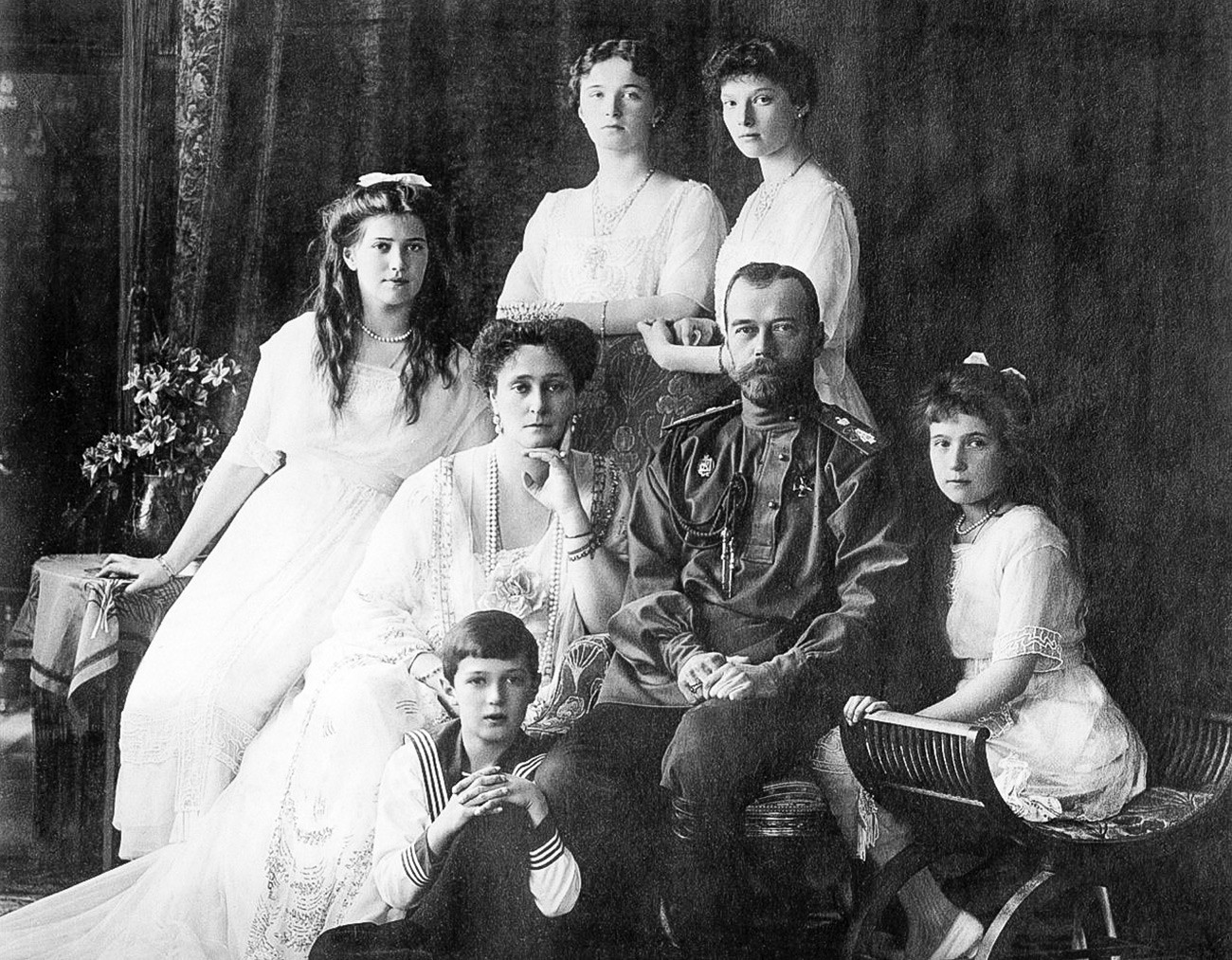 Emperor Nicholas II with his spouse, Alix of Gessen (baptized to Orthodoxy as Alexandra Fedorovna) and their children.