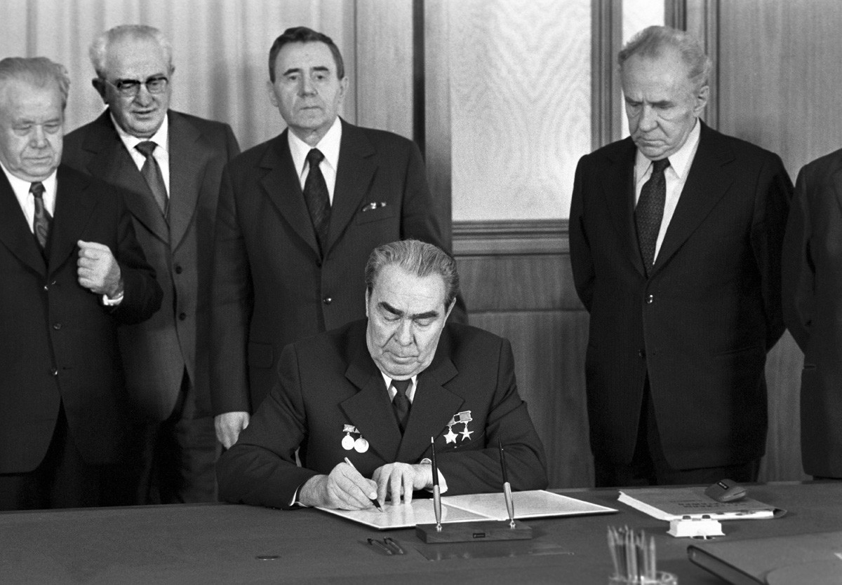 Andropov (second left) standing among the other Soviet party bosses, including Leonid Brezhnev.