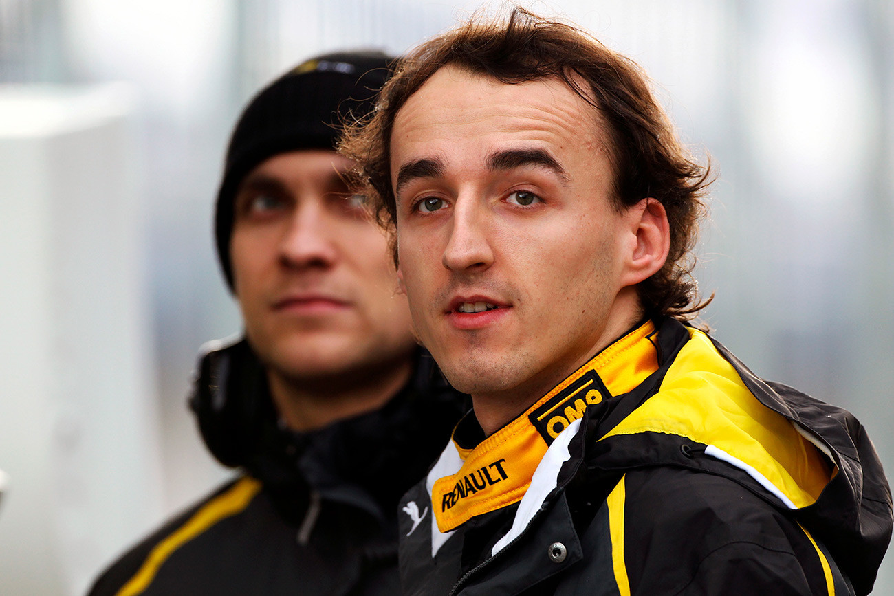 Robert Kubica com o companheiro de equipe Vitáli Petrov.