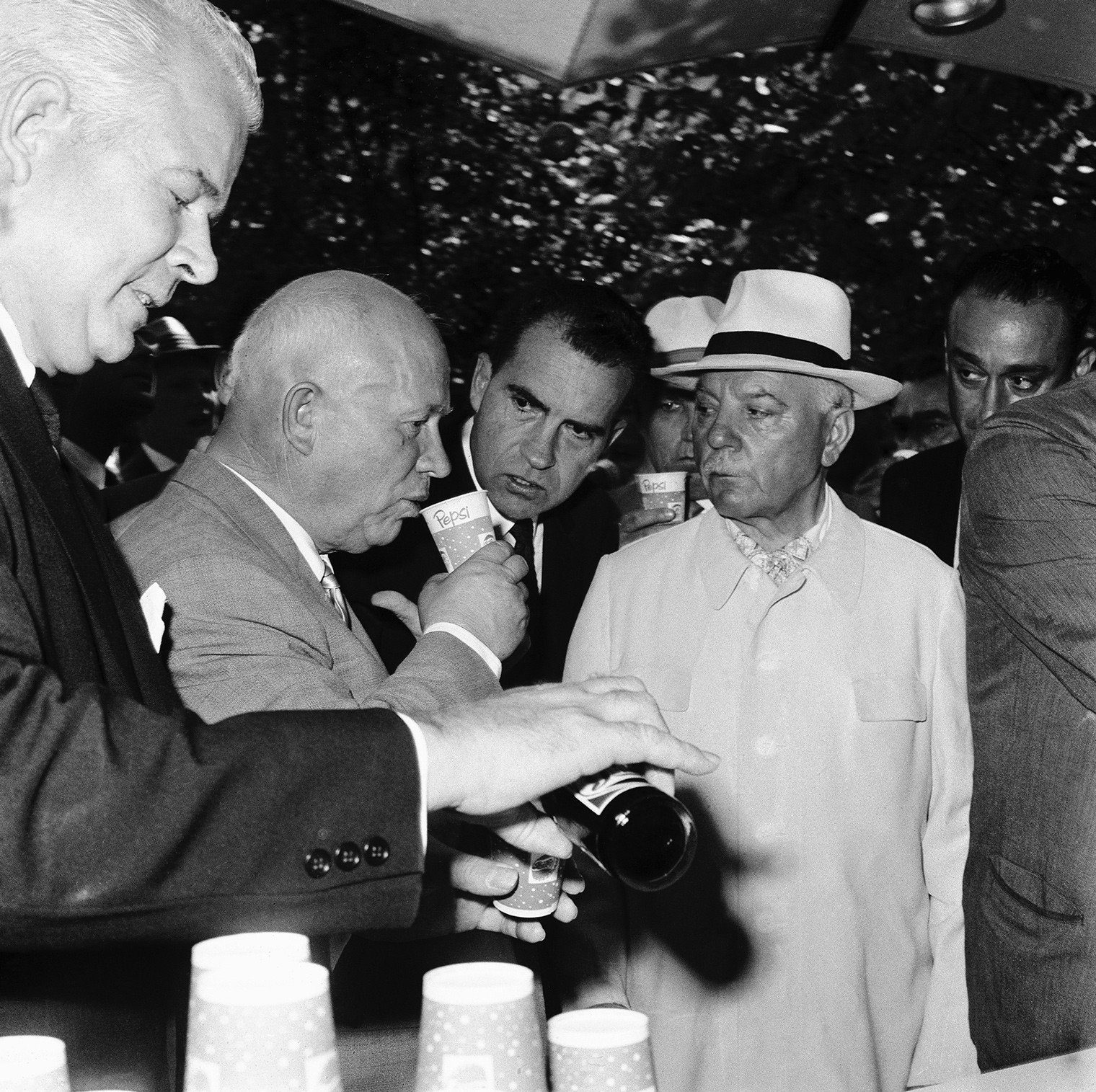Quite a rare photo - Nikita Khrushchev sipping a Pepsi. 