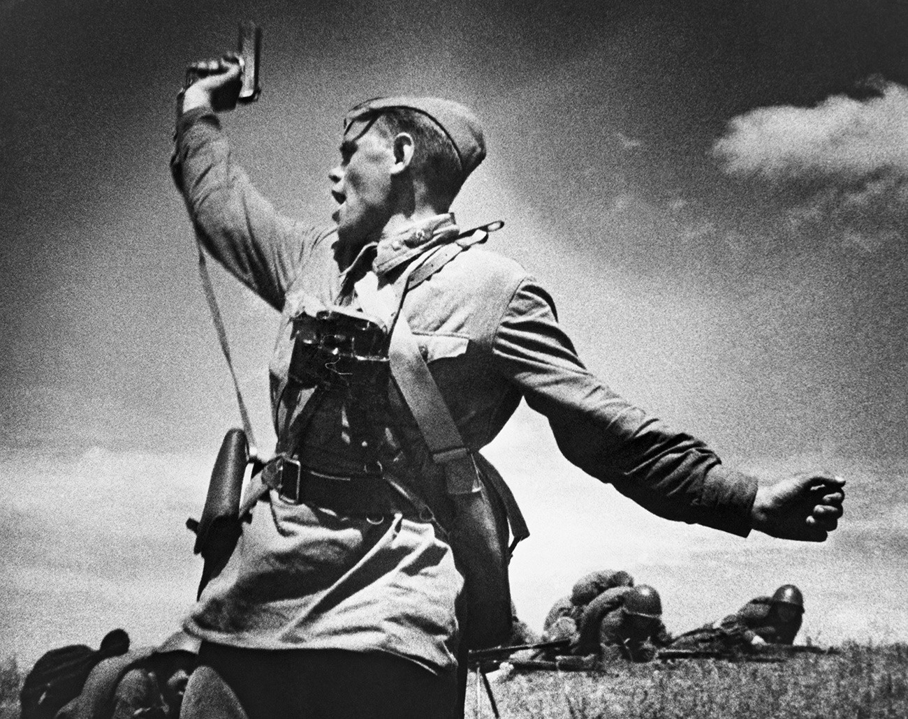 A Soviet officer raising his unit for an attack.