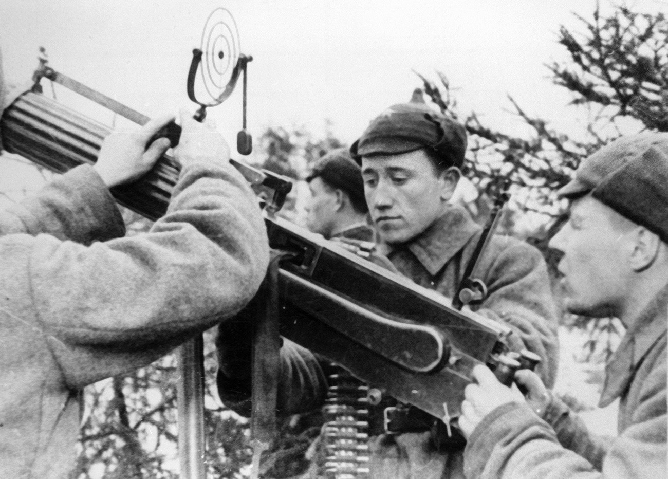 Red Army soldiers prepare anti-aircraft machine-gun for action.