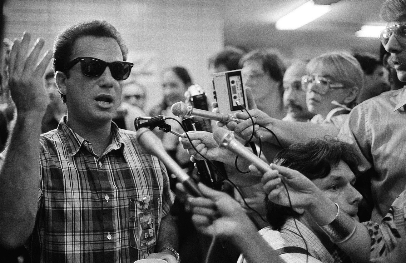 American entertainer Billy Joel answers questions backstage in Moscow, July 26, 1987, before the first concert in his six performance tour of the Soviet Union. He spoke of his visit to the grave of the famous Soviet musician Vladimir Vysotsky on the anniversary of his death on Saturday. 