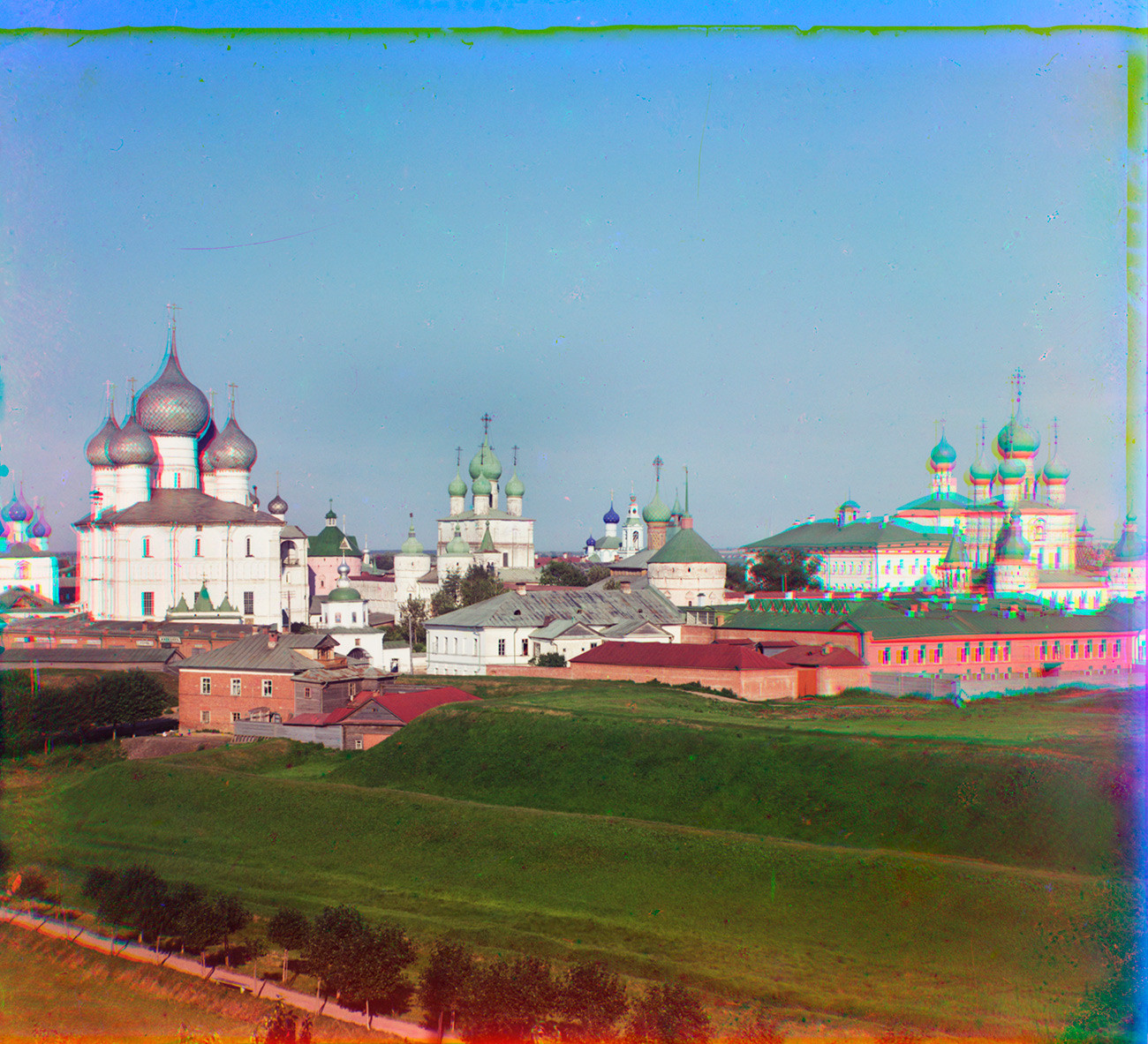 Rostov Kremlin. Northwest view from bell tower of All Saints Church (destroyed). From left: Dormition Cathedral, Church of Resurrection over North Gate, Church of St. John the Divine over West Gate. Summer 1911