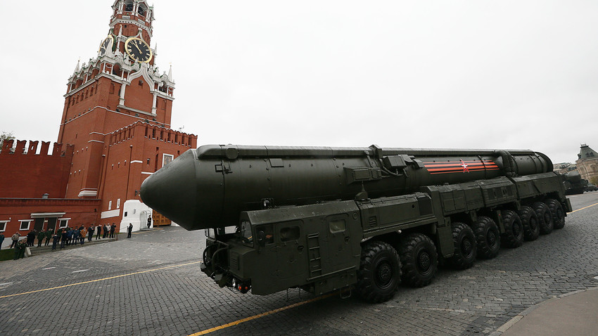 Russian Topol M intercontinental ballistic missile launcher rolls along Red Square