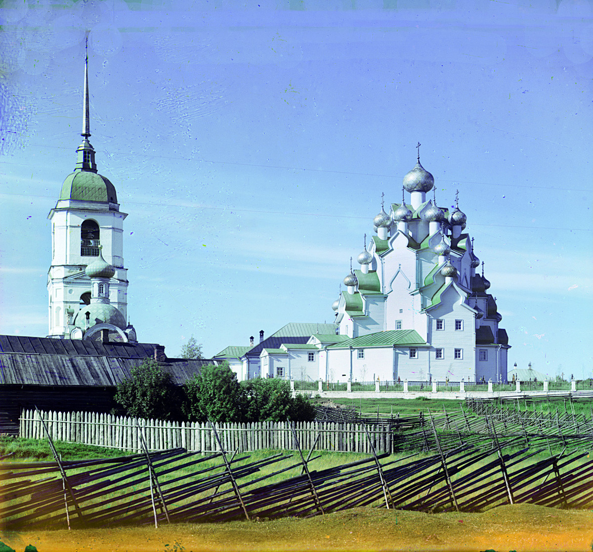 Ankhimovo. Church of the Intercession. Left. Bell tower of Church of Icon of Miraculous Savior Image (church hidden behind Intercession Church) & dome of Church of All Saints. Summer 1909.