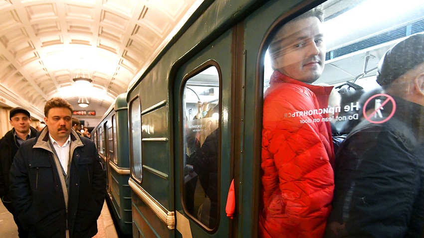 Russia, Moscow. Passengers at the Moscow's 'Teatralnaya' metro station during the rush hour.