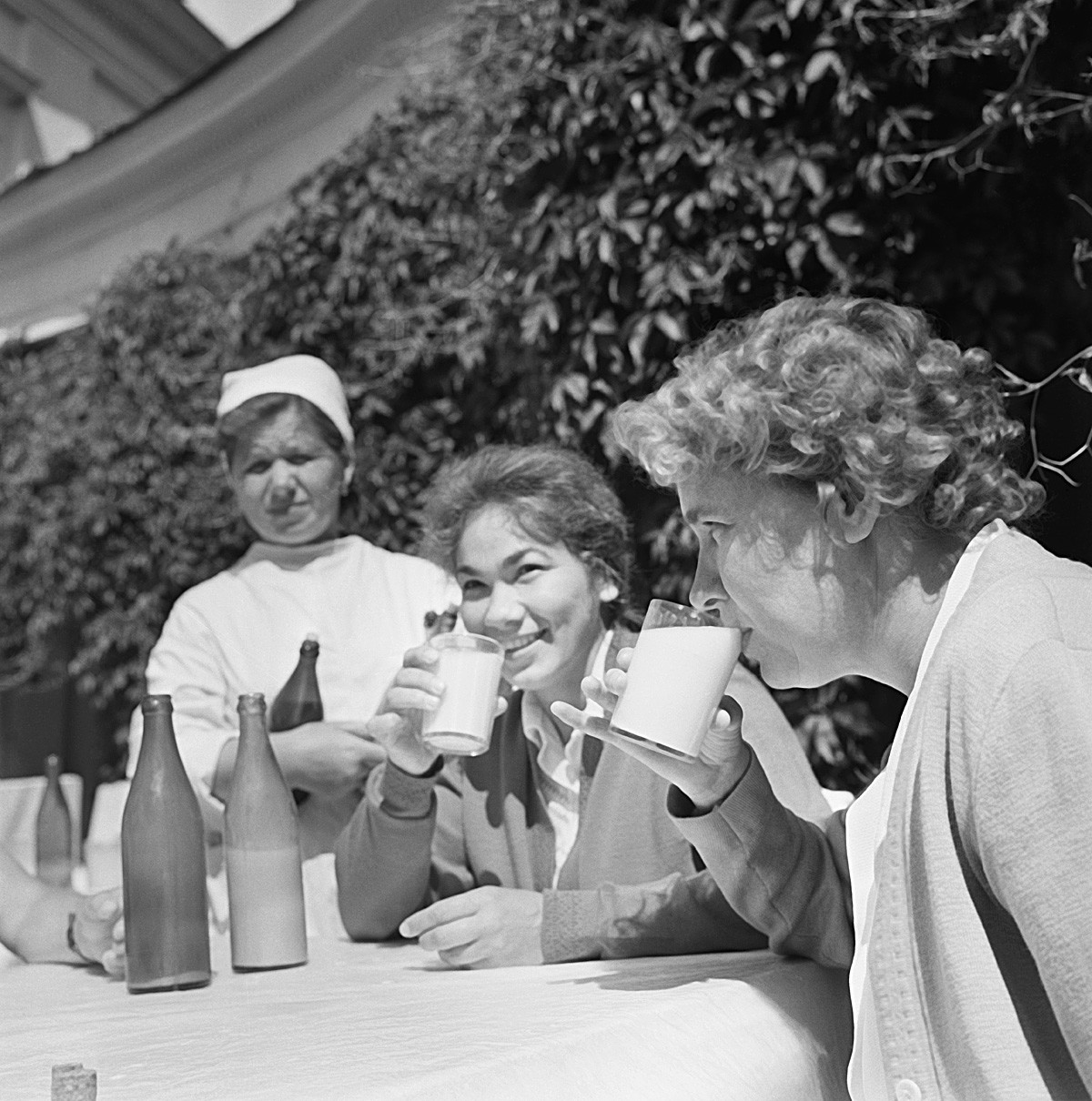  Moscow oblast. USSR. June, 1964. Patients of the Mtsyri tuberculosis prophylactic center Zoya Zanegina and Antonina Reusova drink koumiss during a treatment procedure. 