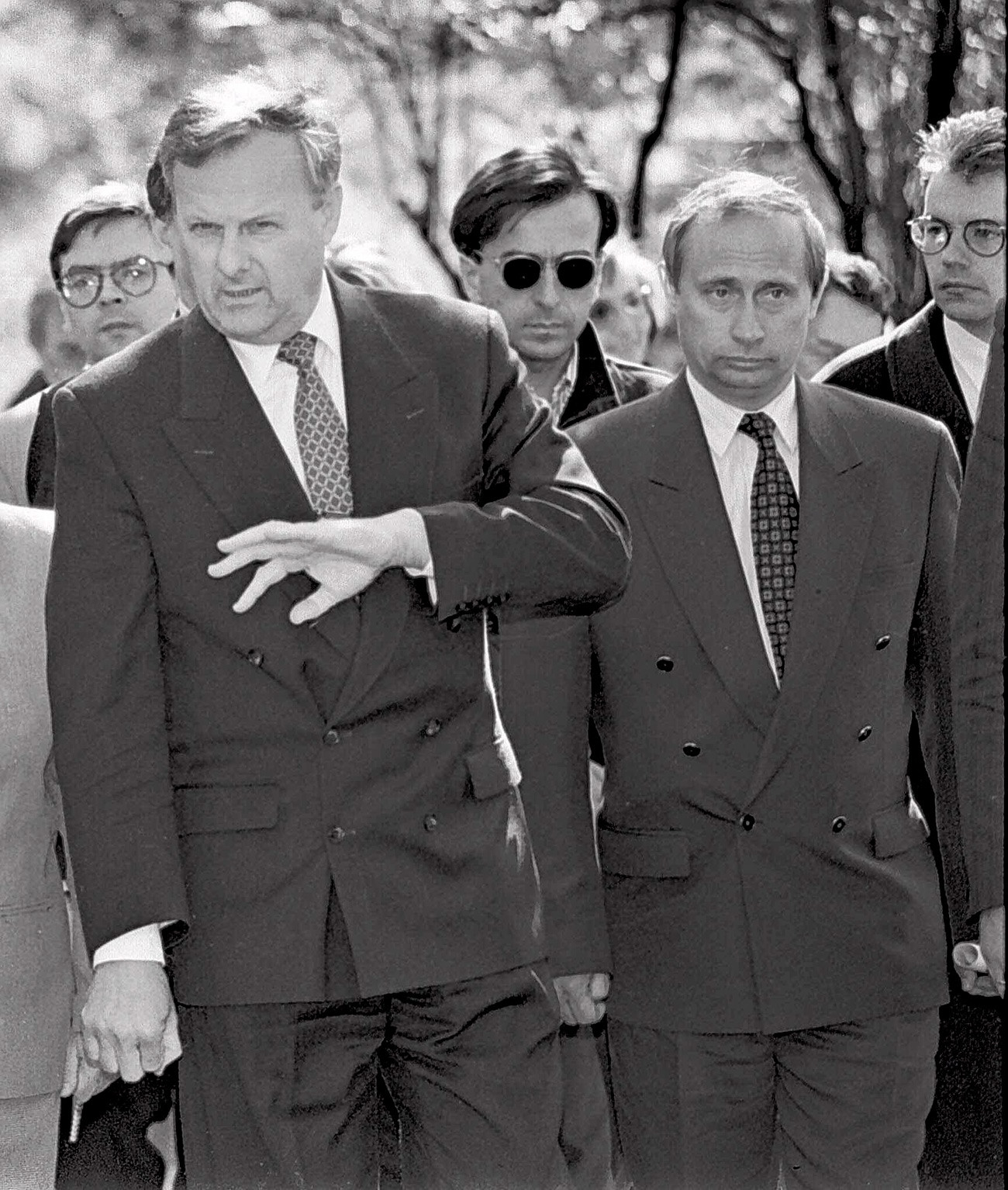 Anatoly Sobchak, mayor of St. Petersburg, gestures with Vladimir Putin, deputy mayor in St. Petersburg in 1994.