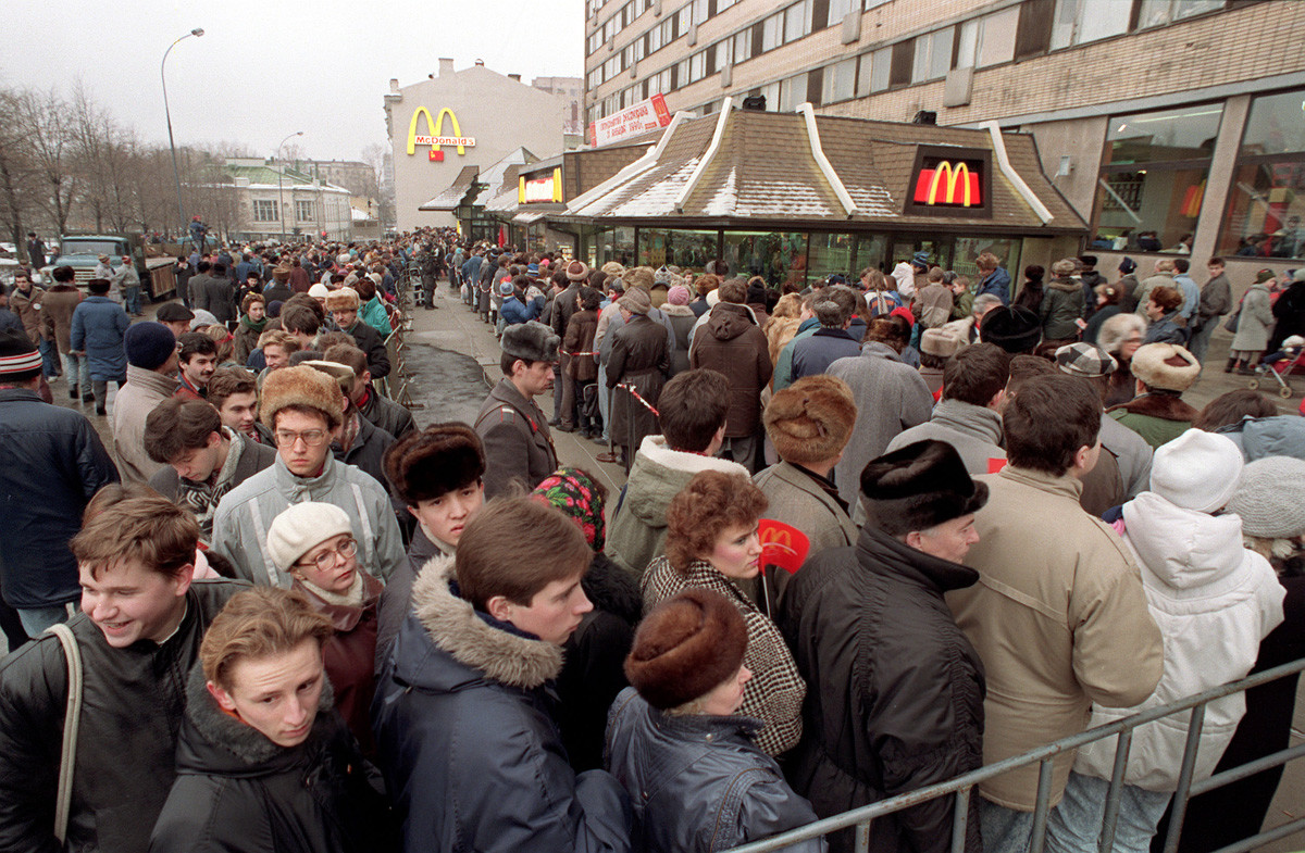 Hundreds of Muscovites line up around the first McDonald's restaurant in the Soviet Union on its opening day, January 1990.