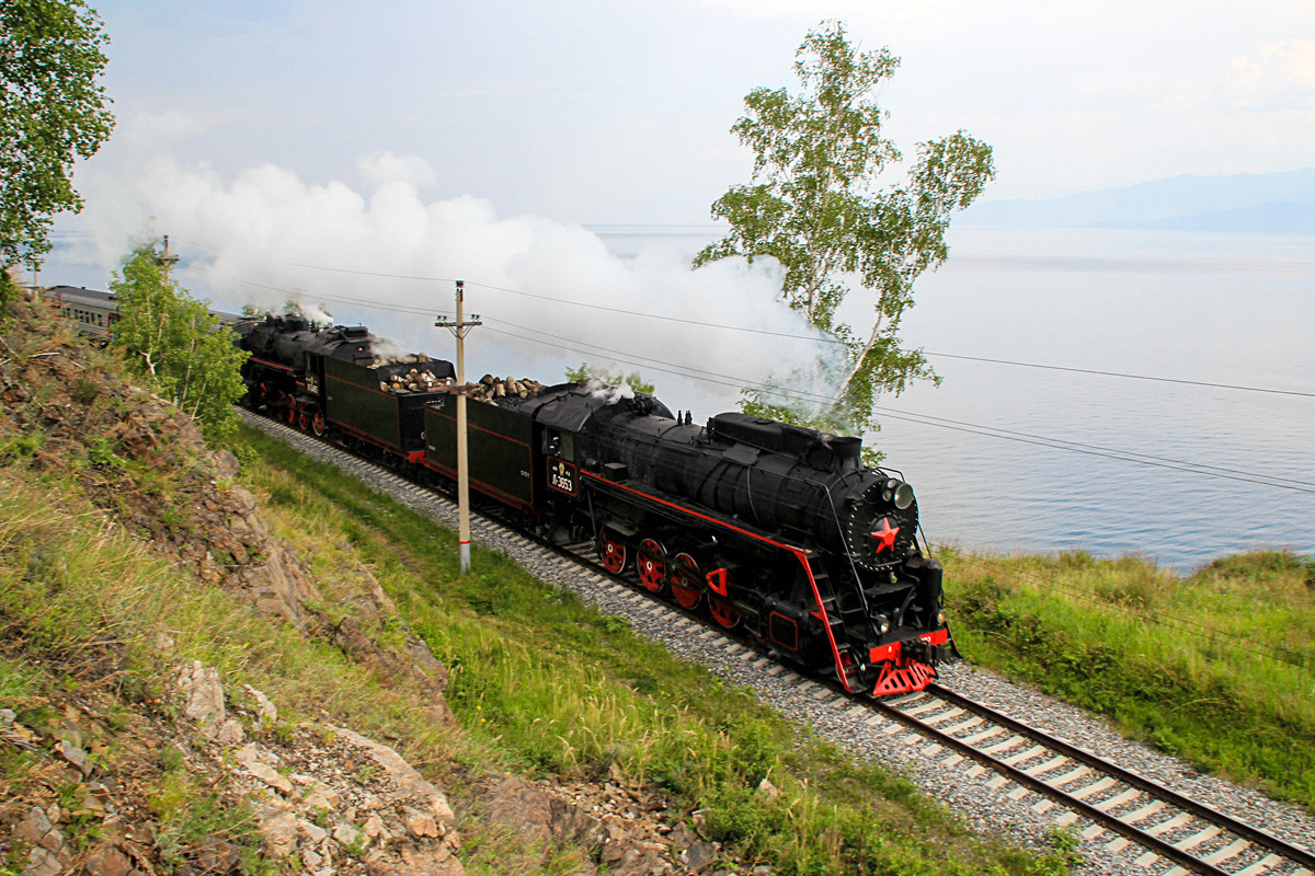  A steam engine of a tour train rides on the Circum-Baikal railway, a part of the East Siberian Railway along the shores of Lake Baikal. 