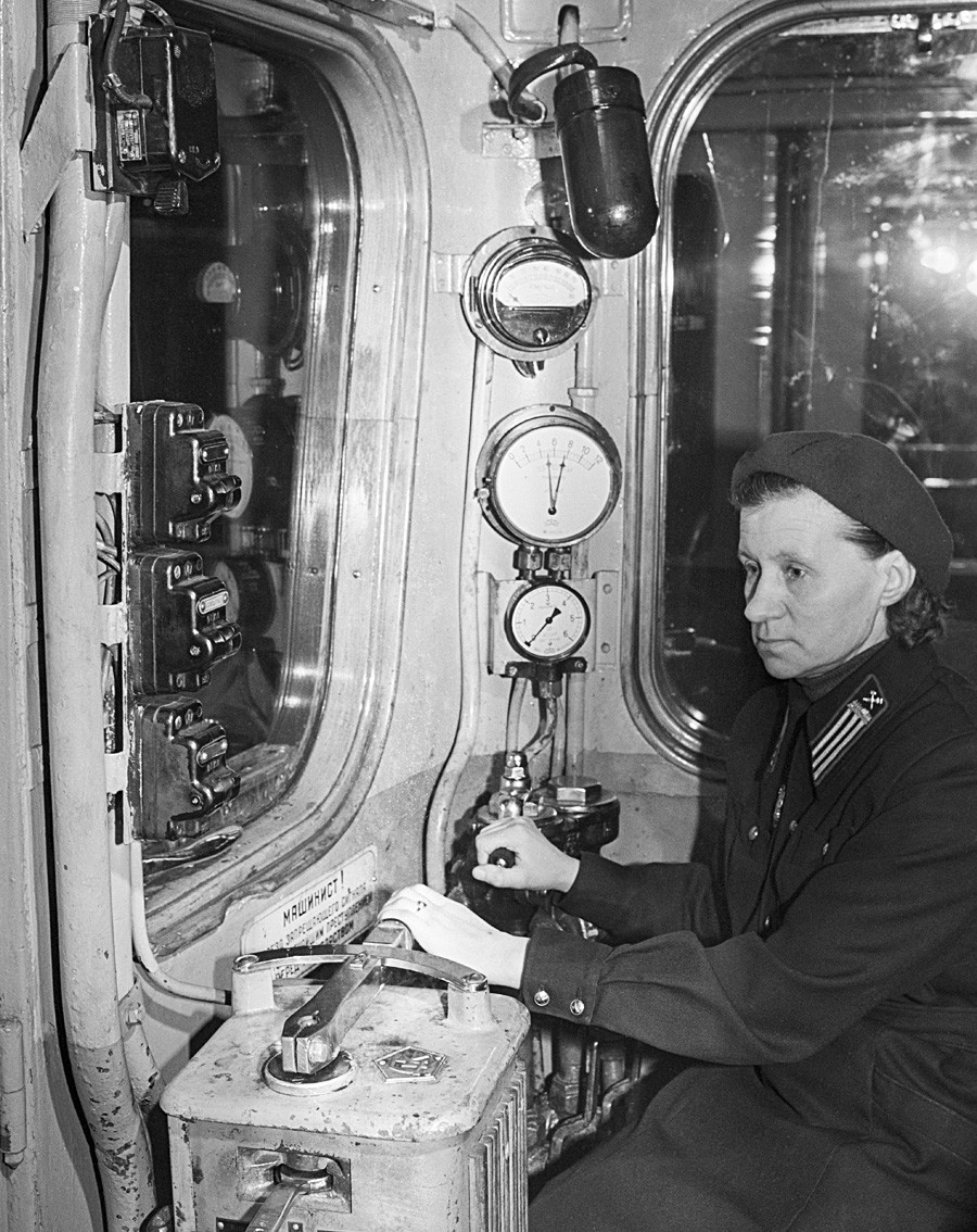 March 1, 1959. A train driver in the cabin of an underground train.