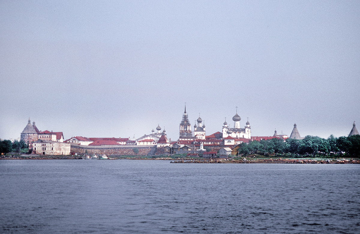 Transfiguration Monastery. West panorama from Solovetsky Bay. Center: Bell tower, Church of St. Nicholas, Transfiguration Cathedral. Left foreground: Preobrazhensky Hotel & dock.  June 29, 1999