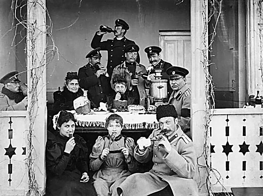 At the dacha’s festive table, 1910s.