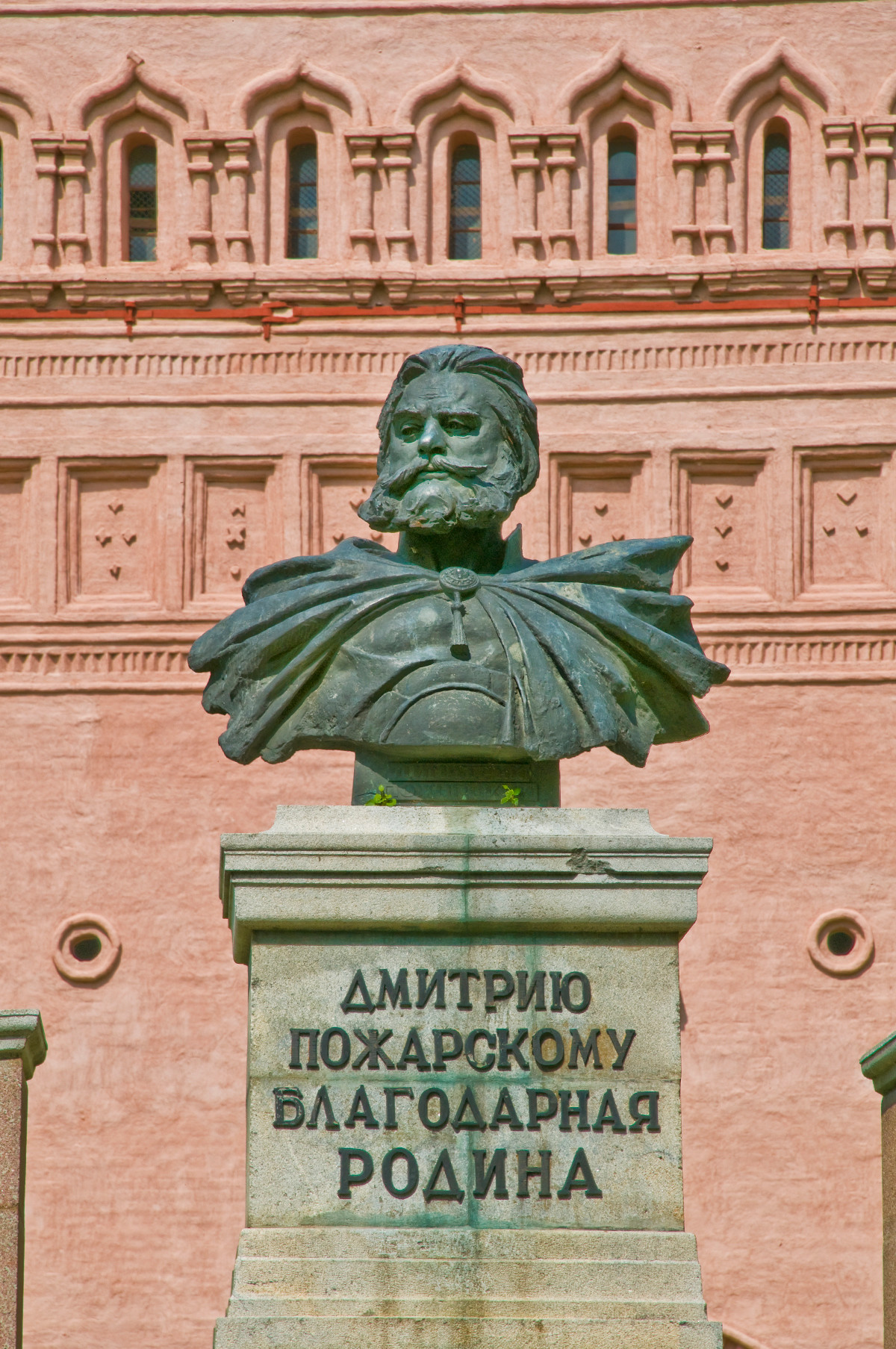 Monument to Prince Dmitry Pozharsky. Background: Main entrance tower of Savior-St. Evfimy Monastery. May 29, 2009
