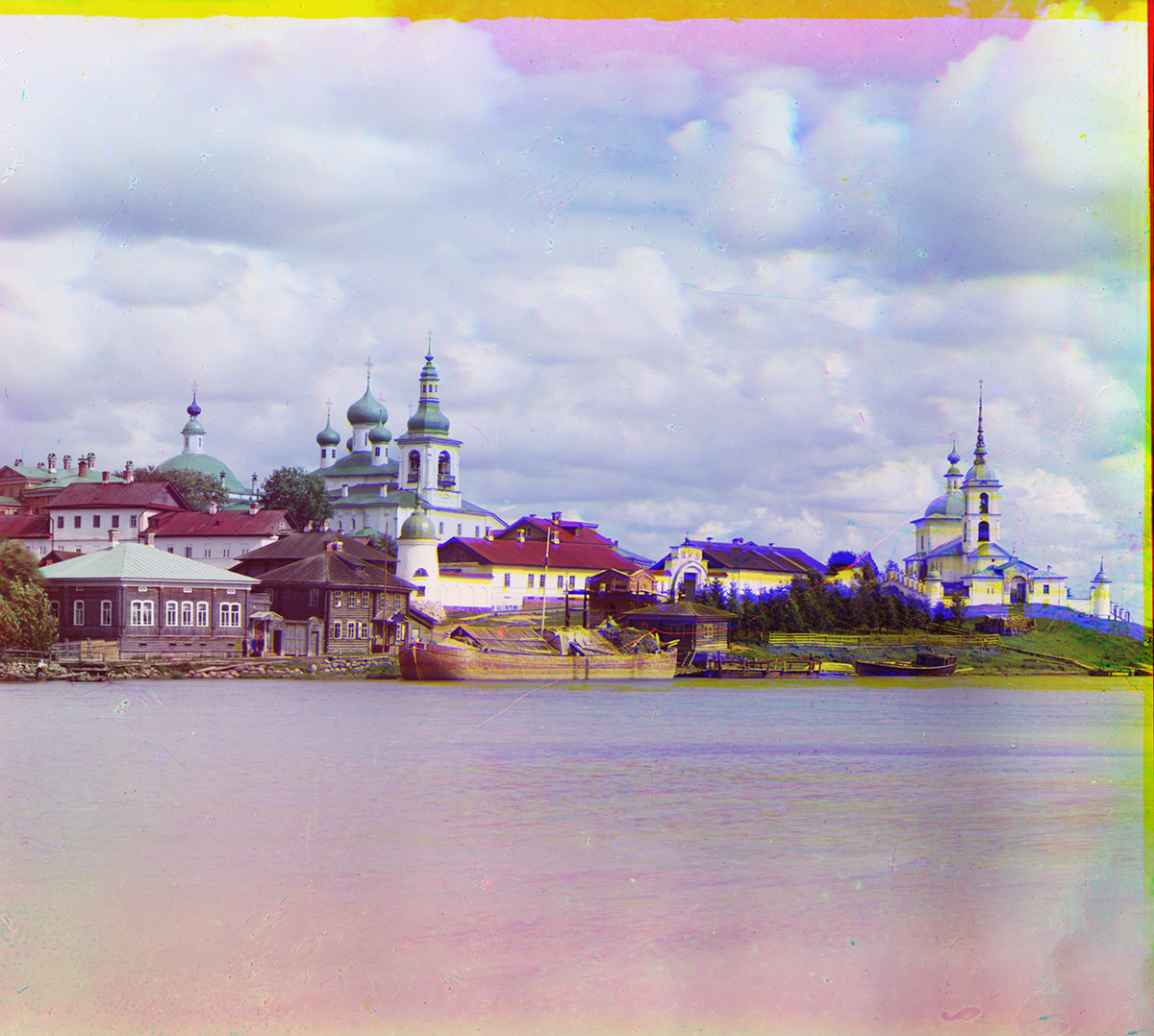 Goritsy. Resurrection Convent, view from Sheksna River. From left: Trinity Cathedral, Resurrection Cathedral, north wall & cloisters, west wall, Church of the Presentation. Summer 1909