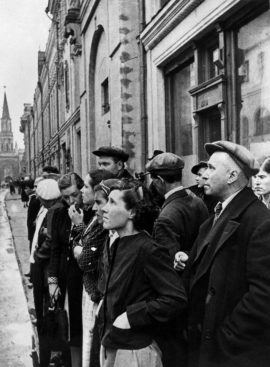 Moscow residents listen to the June 22 government radio announcement on the treacherous invasion of Nazi Germany.