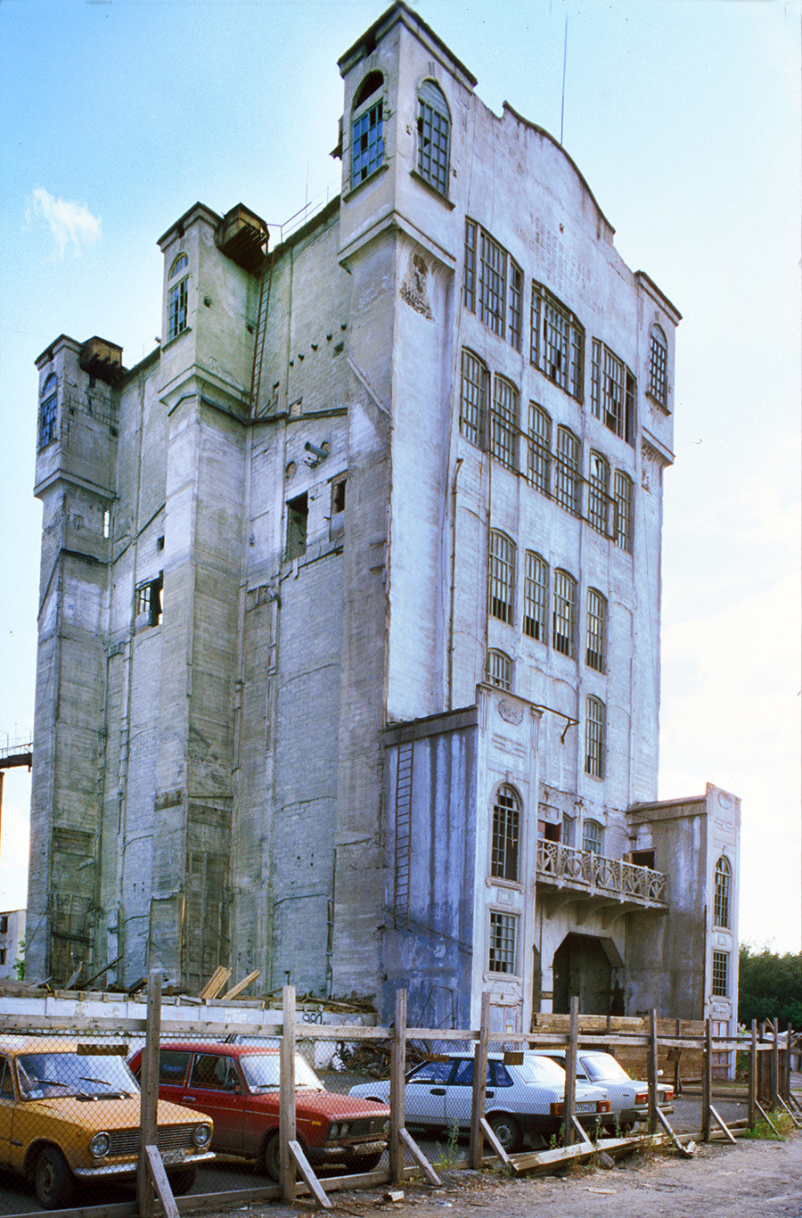 State Bank Grain Elevator. Built in 1914-16 with advanced reinforced concrete technology as part of a national program for grain storage centers. Used until 1990s, then partially demolished. July 12, 2003.