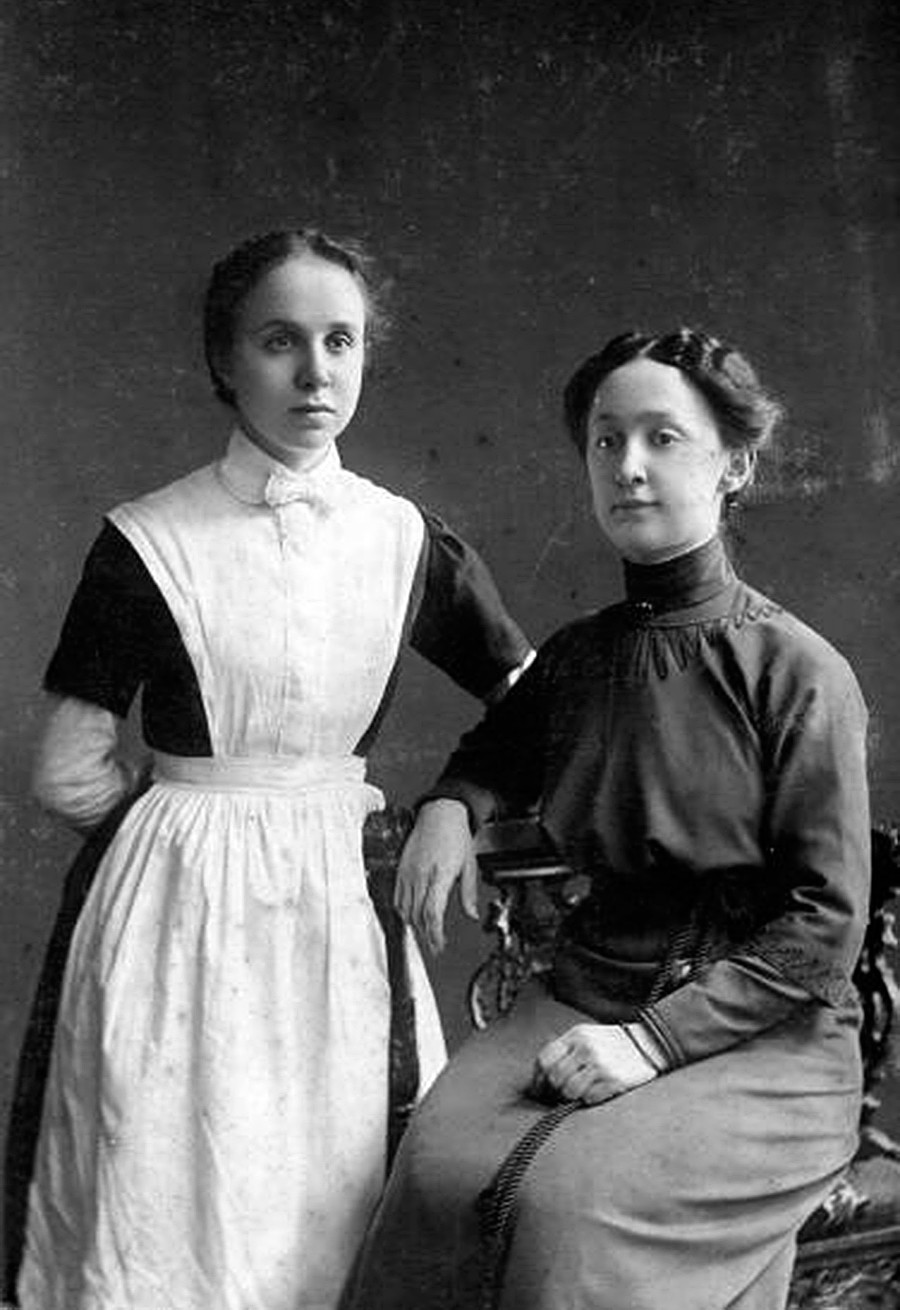 A portrait of a young woman and a girl