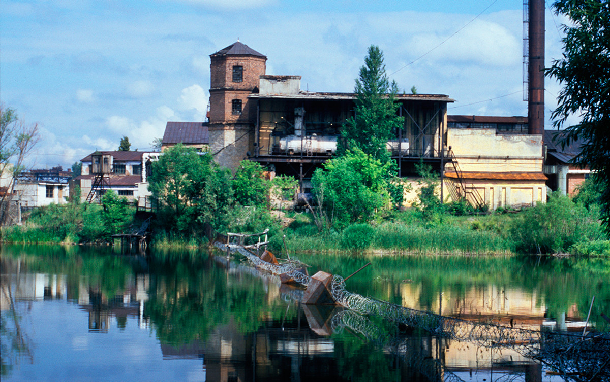 View of factory pond, Kyshtym factory & water tower near former Demidov estate. July 14, 2003.