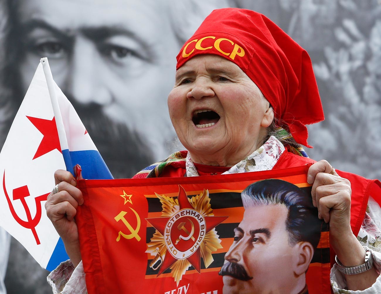 Supporter of Communist party shouts slogans during May Day rally in Moscow.