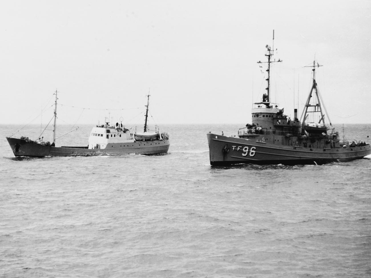 USS Abnaki (ATF-96) and Soviet trawler Gidrofon underway in the South China Sea, 1967.