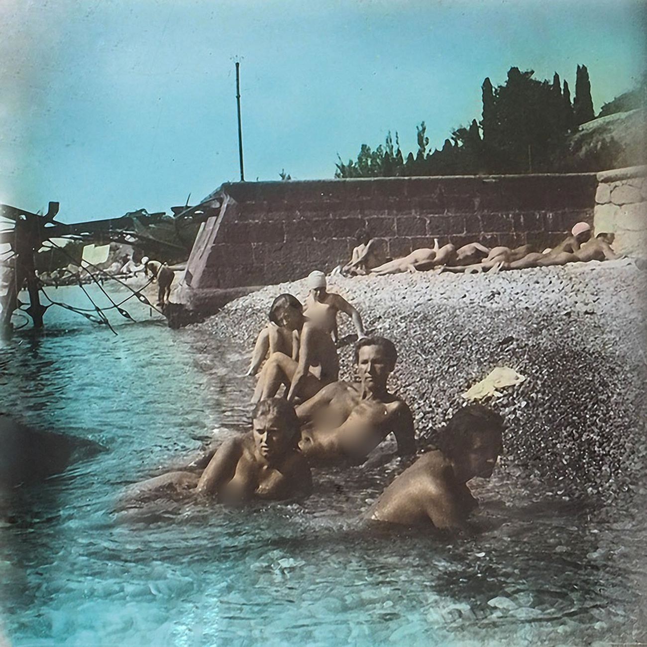 Naked workers and collective farmers on a beach in Crimea, 1931. 