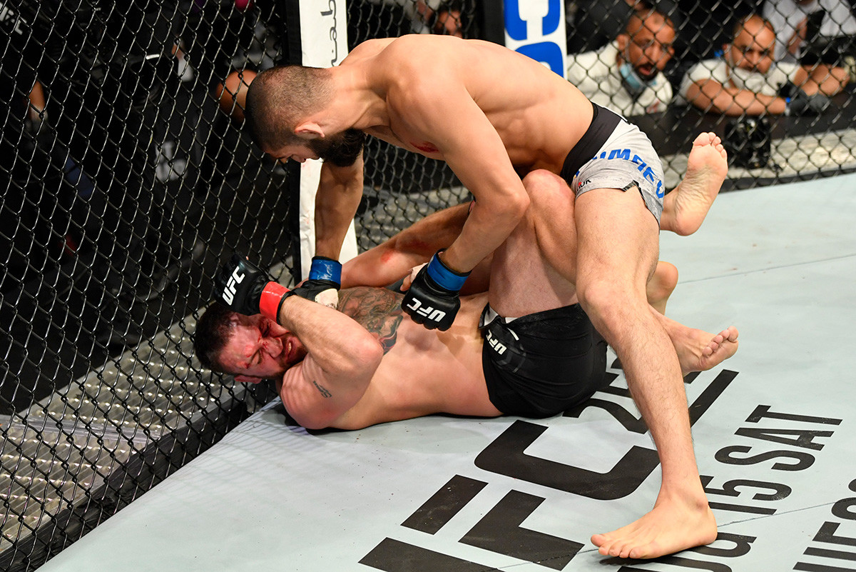 Khamzat Chimaev of Chechnya punches John Phillips of Wales in their middleweight fight during the UFC Fight Night event inside Flash Forum on UFC Fight Island on July 16, 2020 in Yas Island, Abu Dhabi, United Arab Emirates 