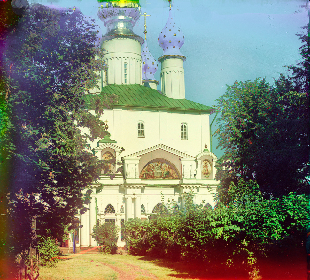 Cathedral of Conception of St. Anne. West view with painting of Old Testament Trinity on tympanum of narthex pediment. Summer 1911