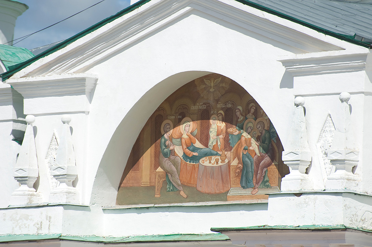 Church of St. Yakov. Restored painting of Nativity of the Virgin on tympanum of narthex pediment. July 7, 2019