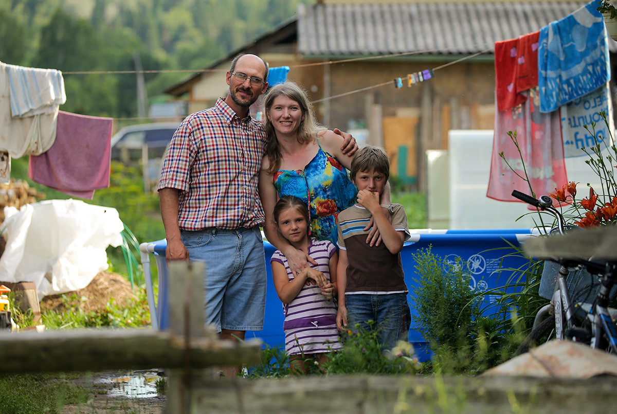 Violinist Dimitr Khetemov, 42, a follower of the Church of the Last Testament religious movement, with his wife Natalya, daughter Sofia, 6, and son Alexander, 9.