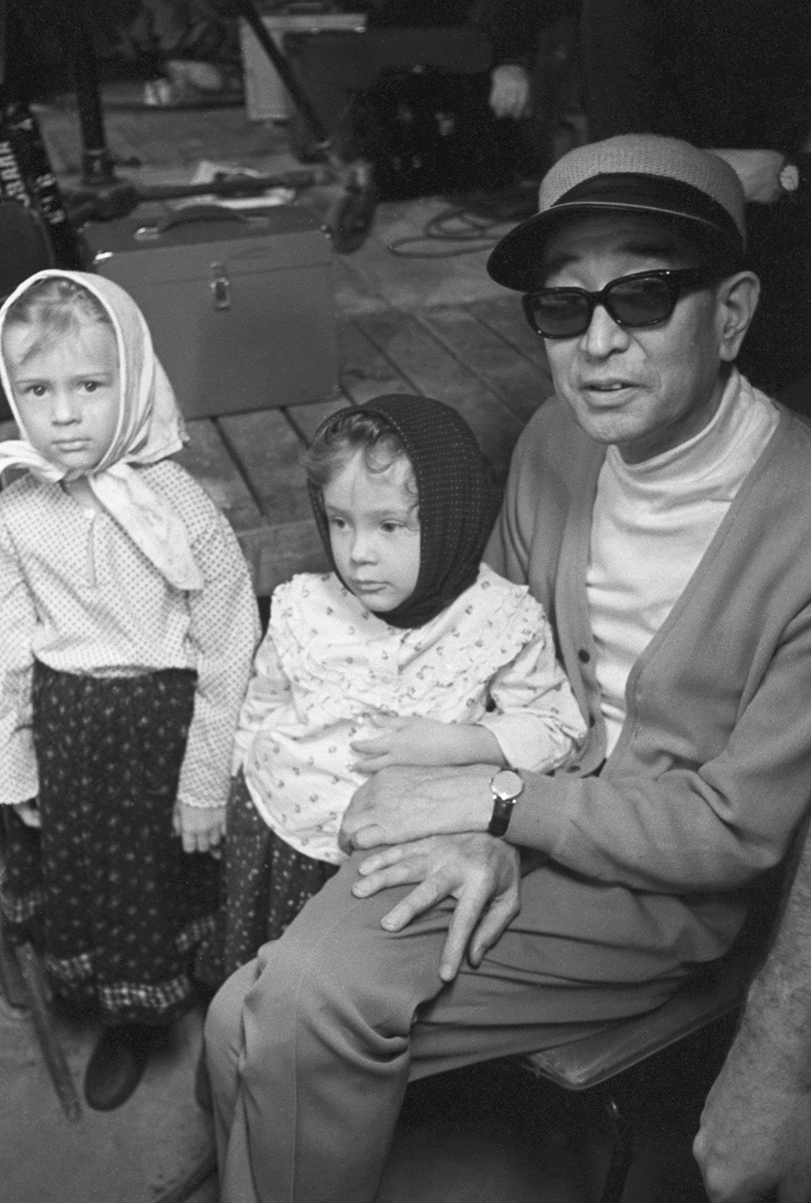 Akira Kurosawa with two Muscovites during 'Dersu Uzala' shooting, 1975