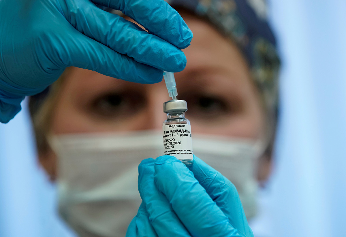 A nurse prepares Russia's "Sputnik-V" vaccine against the coronavirus disease (COVID-19) for inoculation in a post-registration trials stage at a clinic in Moscow