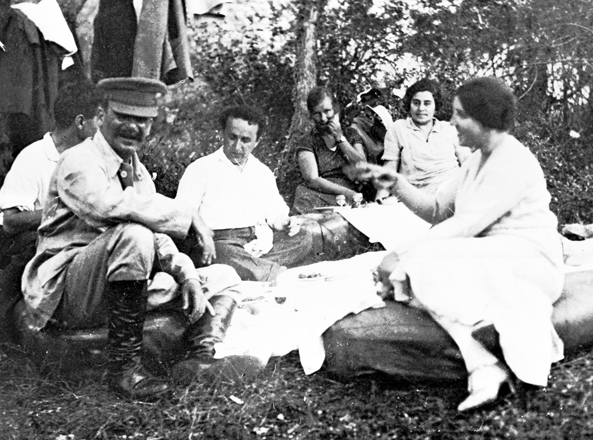 Stalin with his friends and his wife Nadezhda Allilueva (R)